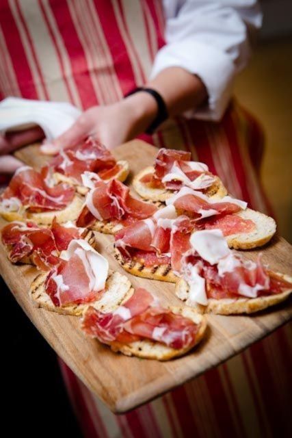 Barcelona: Evening Walking Tour in the Gaudi Area with Tapas - The historic bodega and Catalan flavors