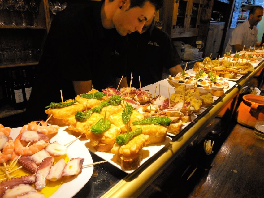 Barcelona: Evening Walking Tour in the Gaudi Area with Tapas - Starting near Casa Sayrach in L’Eixample