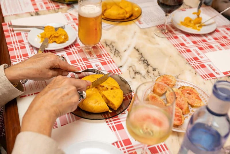 Barcelona: Gaudi Tapas & Wine Tasting Small Group Tour - The tortilla stop and Spain’s comfort food