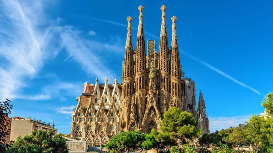 Barcelona: Sagrada Familia and City Tour with Hotel Pickup - Passeig de Gracia and the planned Eixample