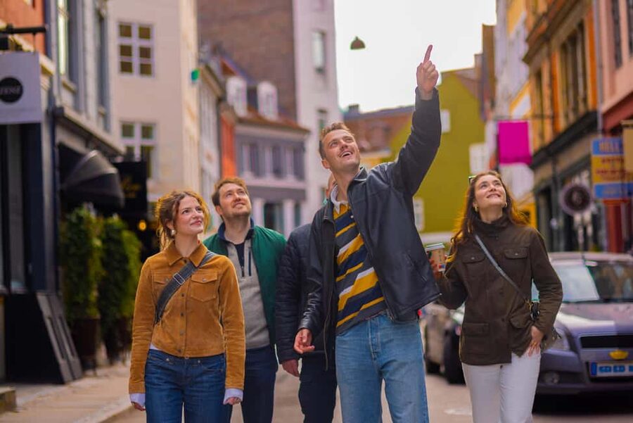 Copenhagen: Danish Design and Architecture Walking Tour - Nyhavn shows old buildings with a modern role