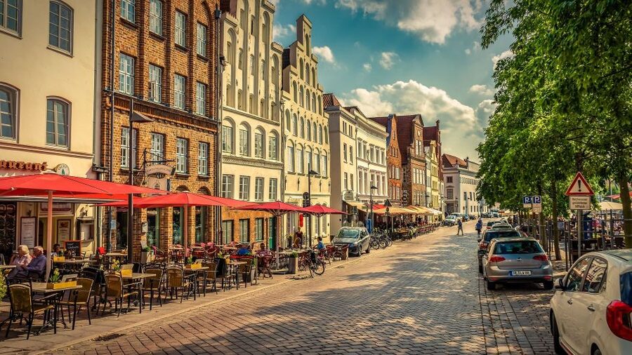 Lübeck: Private Historical and Architectural Walking Tour - St. Mary’s Church and a small devil outside